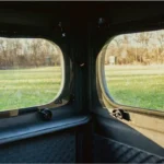 Redneck solo hunting blind interior windows.