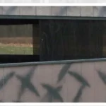 County line dark brown wooden hunting blind windows.