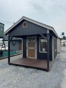 shed with Charcoal metal roof, black exterior, clay trim, front porch, transom doors, diamond plate