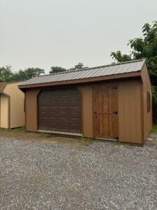 garage with Bronze metal roof, quaker tan exterior, chestnut trim, work bench, silverline, garage door, diamond plate, Z shutters