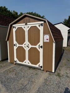 Barn with Hickory shingles, Q Tan exterior, white trim, diamond plate 